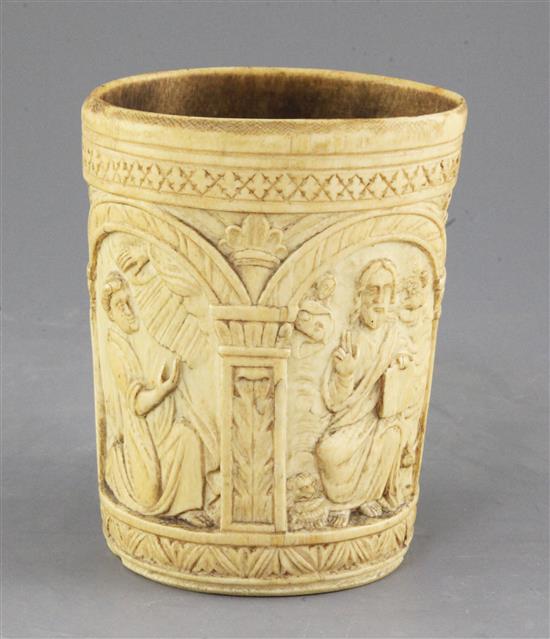 A carved ivory situla, late 19th century in Medieval style, height 6.5in.